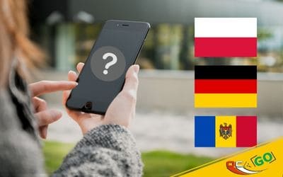 Жінка тримає в руках смартфон, а поряд прапори країн: Польща, Німеччина, Молдова